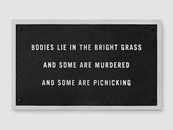 Survival: Bodies lie in the bright grass…
