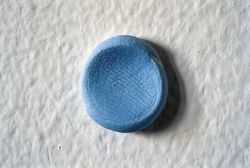 Work No. 79 – Some Blu-tack kneaded, rolled into a ball, and depressed against a wall